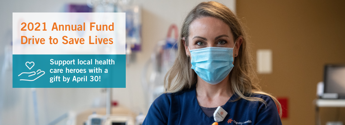 Portrait of a female French Hospital nurse wearing a mask in a patient room. Test reads "2021 Annual Fund Drive to Save Lives. Support local health care heroes with a gift by April 30."