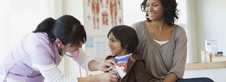 Doctor with child and mother