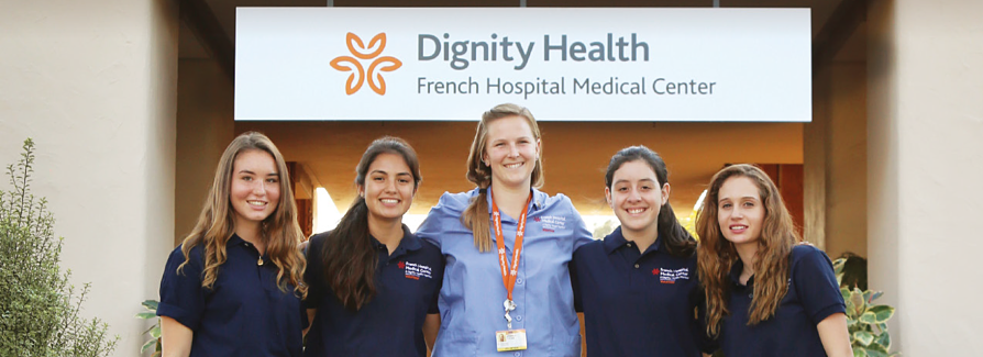 Five female Dignity Health Employees in front of French Hospital Five female Dignity Health Employees in front of French Hospital