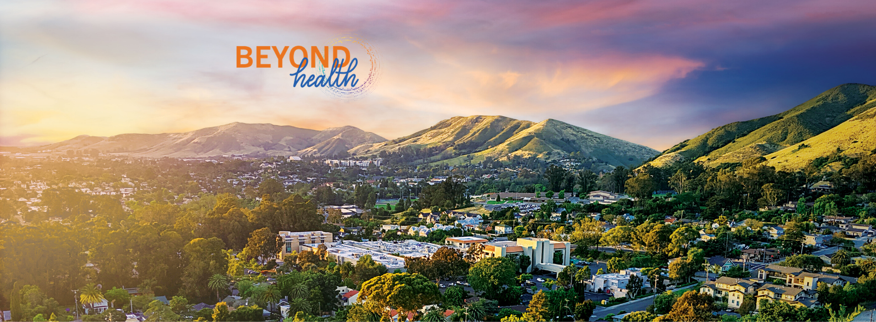 Beyond Health logo overlayed on a panoramic photography of French Hospital Medical Center and San Luis Obispo.