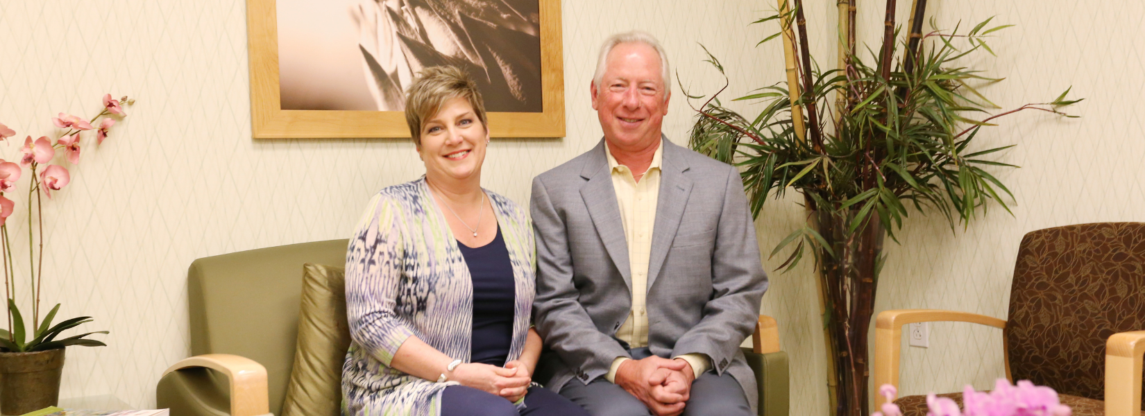 Portrait of Karen and Steve Chubon sitting in the Hearst Cancer Resource Center