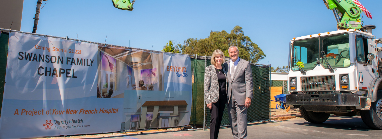 Donors Bill and Cheryl Swanson stand in front of the construction site for the Swanson Family Chapel Donors Bill and Cheryl Swanson stand in front of the construction site for the Swanson Family Chapel