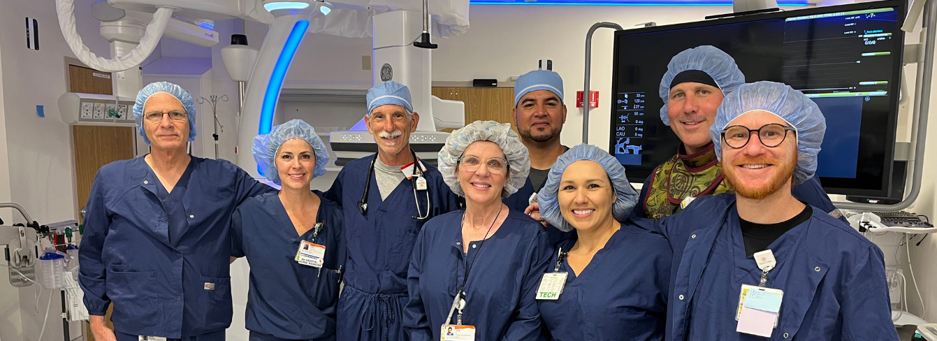 French Hospital cardiac surgery team members standing in a surgical suite  