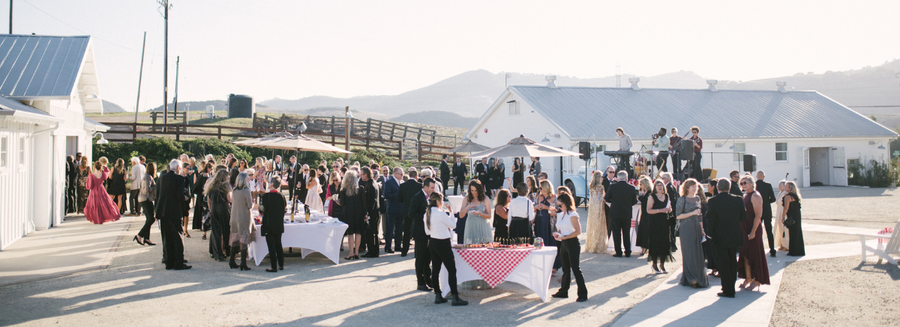 Guests enjoy the reception outdoors at the Octagon Barn during the 2022 Celebration of Caring Gala
