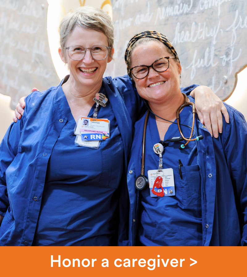 Portrait of two smiling French Hospital nurses. Copy reads "Honor a caregiver".