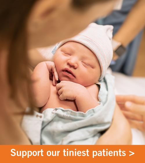 Image of a newborn baby being held by its mother. Copy reads "Support our tiniest patients".
