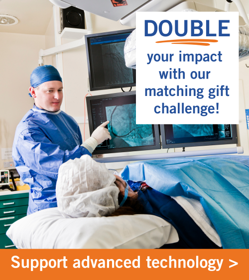 Physician shows a patient advanced imaging in a surgical suite.. Copy reads Support advanced technology. Double your impact with our matching gift challenge.