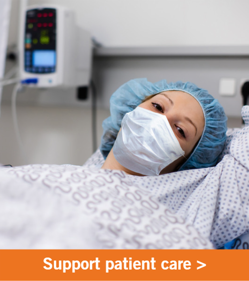 A young female patient lays in a hospital bed. Copy reads "Support our patients".