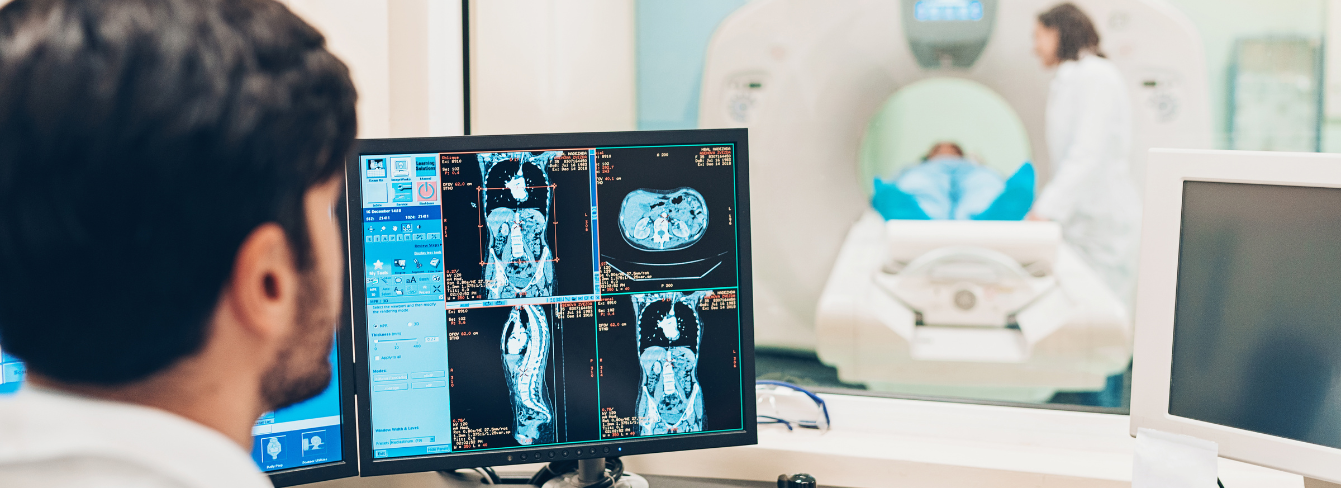 Hospital tech reviewing imaging
